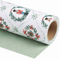 Nutcracker Wreaths wrapping paper roll, unrolled to show the solid sage green back