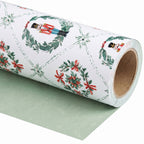 Nutcracker Wreaths wrapping paper roll, unrolled to show the solid sage green back
