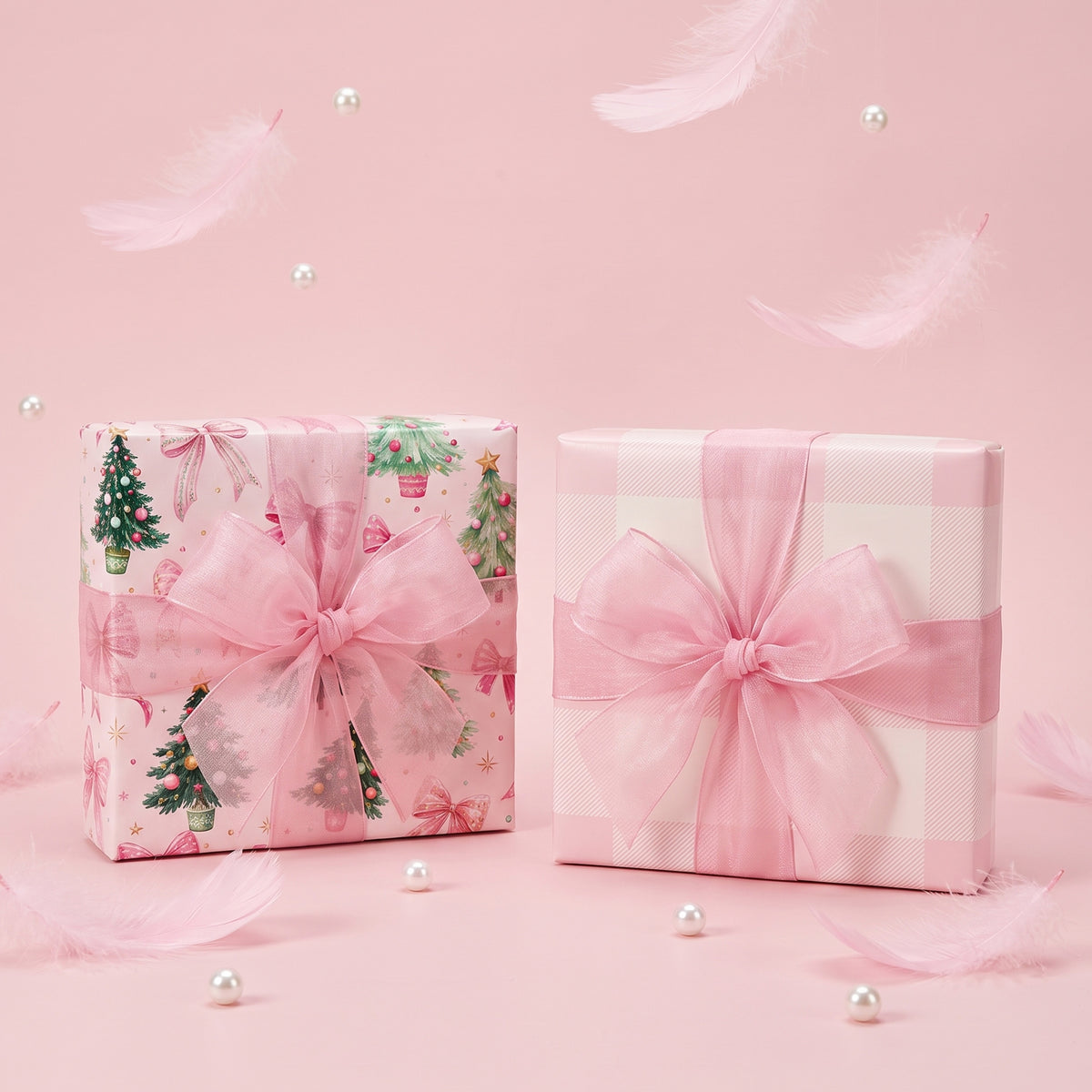 Two gifts wrapped in Pink Trees & Bows paper, one showing the pink gingham back, with sheer pink bows